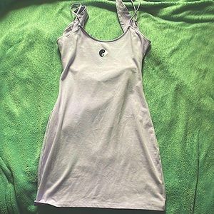 SO small mini dress, lavender color, with a yin and Yang symbol on the front.